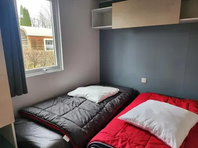 Un ou plusieurs lits dans un hébergement de l'établissement camping les pêcheurs