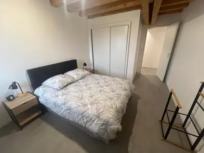 Un ou plusieurs lits dans un hébergement de l'établissement Maison Loft au pied des Vignes