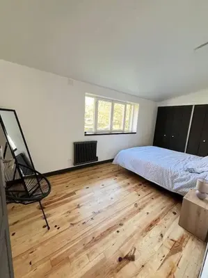 Un ou plusieurs lits dans un hébergement de l'établissement Maison au bord de rivière