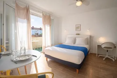 Un ou plusieurs lits dans un hébergement de l'établissement Le Kuku Beach - Appartement de charme à Digoin