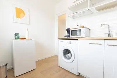 Cuisine ou kitchenette dans l'établissement Le Kuku Beach - Appartement de charme à Digoin