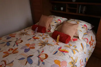Un ou plusieurs lits dans un hébergement de l'établissement Chalet au bord de l eau