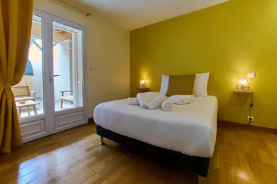 Un ou plusieurs lits dans un hébergement de l'établissement « Le Clos de la Côte d’Or »