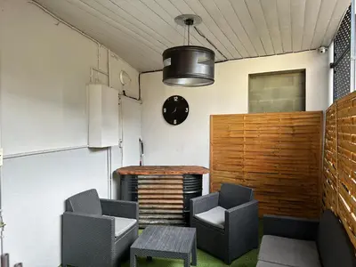 Coin salon dans l'établissement F2 hyper centre ville Lons