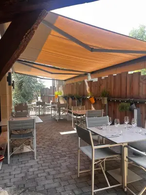 Restaurant ou autre lieu de restauration dans l'établissement La Rotisserie du Chambertin