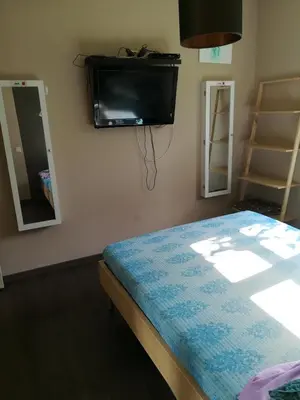 Un ou plusieurs lits dans un hébergement de l'établissement Notre nid d'amour - jacuzzi, piscine, billard, bar extérieur, terrain de boules