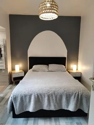 Un ou plusieurs lits dans un hébergement de l'établissement Appartement Cosy