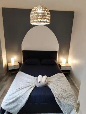 Un ou plusieurs lits dans un hébergement de l'établissement Appartement Cosy