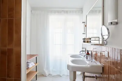 Salle de bains dans l'établissement Le Clos des Rosiers