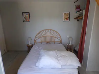Un ou plusieurs lits dans un hébergement de l'établissement Maison calme & paisible avec vue