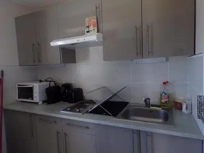 Cuisine ou kitchenette dans l'établissement Maison calme & paisible avec vue