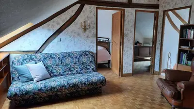 Coin salon dans l'établissement Chambres d’Hôtes Les Melogottes