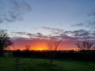 Lever ou coucher de soleil vu de la maison de vacances ou à proximité