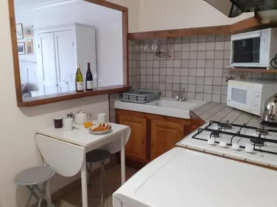 Cuisine ou kitchenette dans l'établissement Le Vendangeur