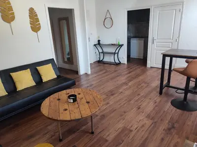 Coin salon dans l'établissement T1 lumineux et climatisé