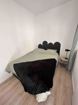 Un ou plusieurs lits dans un hébergement de l'établissement Casa Nena, nid douillet , quartier BSB, République