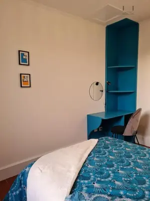 Un ou plusieurs lits dans un hébergement de l'établissement Art déco