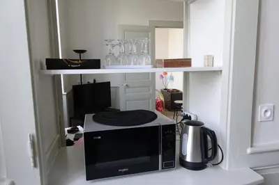 Cuisine ou kitchenette dans l'établissement Lons-le Saunier Appartement Site remarquable