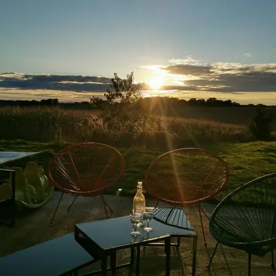 Lever ou coucher de soleil vu de la maison de vacances ou à proximité