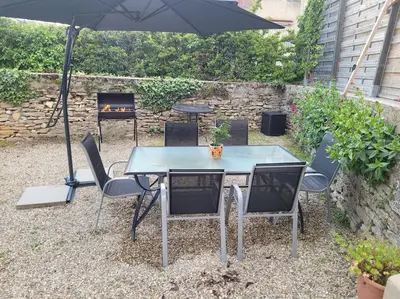 Jardin de l'établissement Petite maison au cœur des vignes