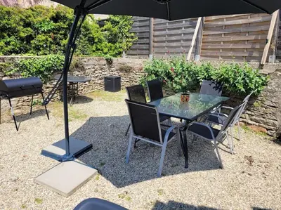 Jardin de l'établissement Petite maison au cœur des vignes