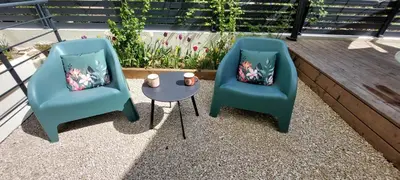 Coin salon dans l'établissement Le Jardin des Ecureuils