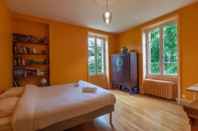 Un ou plusieurs lits dans un hébergement de l'établissement Cabana & Maison des Vignes