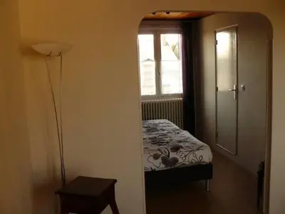 Un ou plusieurs lits dans un hébergement de l'établissement Auberge Fleurie