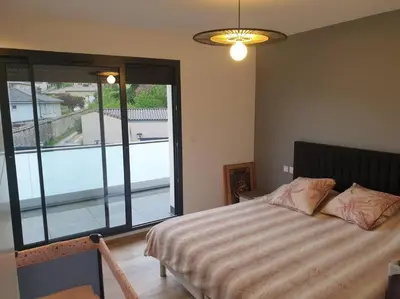 Un ou plusieurs lits dans un hébergement de l'établissement location villa moderne piscine