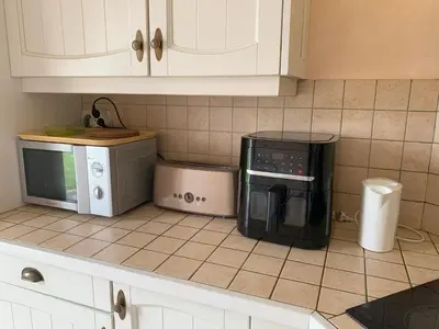 Cuisine ou kitchenette dans l'établissement Une pause à Dompierre