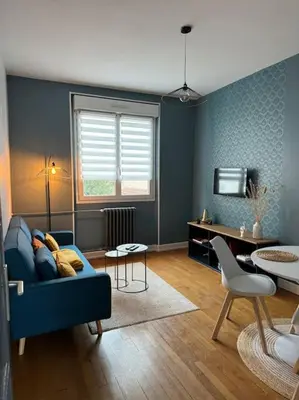 Coin salon dans l'établissement Constantine Suits 21 - Appartement 4 personnes Dijon centre