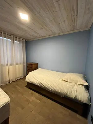Un ou plusieurs lits dans un hébergement de l'établissement Maison de campagne