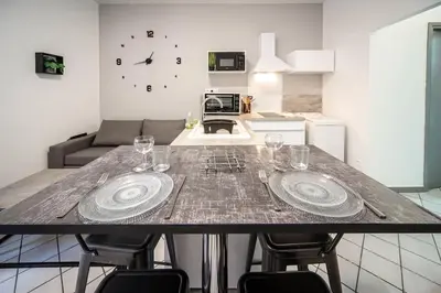 Cuisine ou kitchenette dans l'établissement Appartement cosy Hyper centre