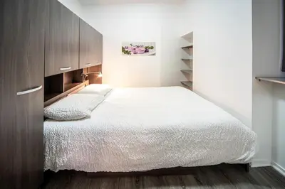 Un ou plusieurs lits dans un hébergement de l'établissement Appartement cosy Hyper centre