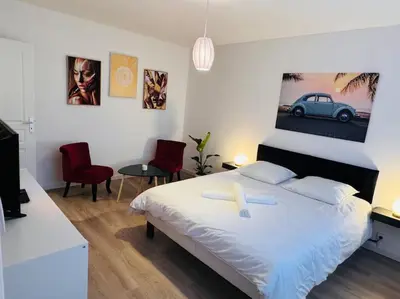 Un ou plusieurs lits dans un hébergement de l'établissement Appartement Chalon