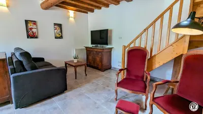 Télévision ou salle de divertissement dans l'établissement Au bout du Ciel - Maison avec garage, terrasse, cave