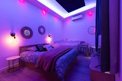 Un ou plusieurs lits dans un hébergement de l'établissement Harmonie Spa