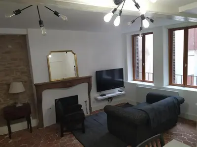 Télévision ou salle de divertissement dans l'établissement Le cosy
