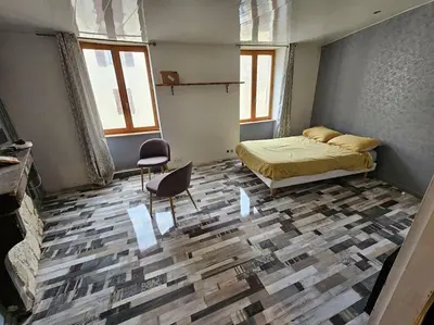 Un ou plusieurs lits dans un hébergement de l'établissement studio à 30 min des lacs