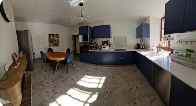Cuisine ou kitchenette dans l'établissement Suite parentale privée avec salle de bain