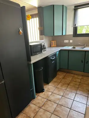 Cuisine ou kitchenette dans l'établissement LA Dryade 6