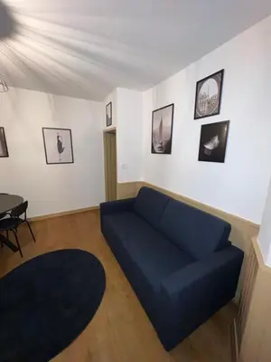 Coin salon dans l'établissement Appartement Dijon le Zola