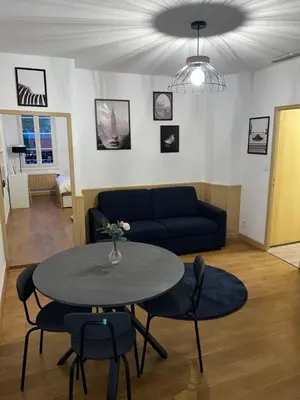 Coin salon dans l'établissement Appartement Dijon le Zola