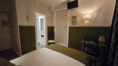 Un ou plusieurs lits dans un hébergement de l'établissement Auberge de la Marine
