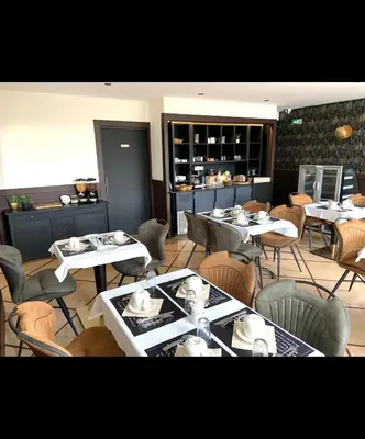 Coin salon dans l'établissement Auberge de la Marine