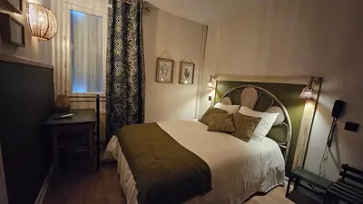 Un ou plusieurs lits dans un hébergement de l'établissement Auberge de la Marine