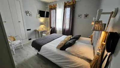 Un ou plusieurs lits dans un hébergement de l'établissement Auberge de la Marine