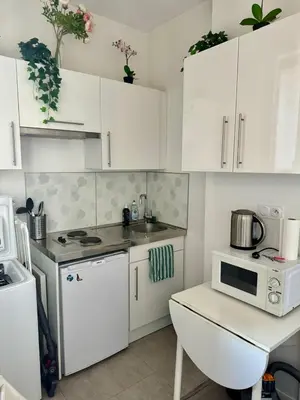 Cuisine ou kitchenette dans l'établissement Studio au coeur du centre historique