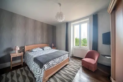 Un ou plusieurs lits dans un hébergement de l'établissement Au bord de La Saône - Maison pour 6 avec jardin