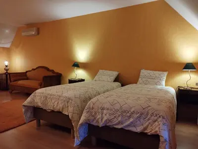 Un ou plusieurs lits dans un hébergement de l'établissement La Baudinière, Chambre La Dorée